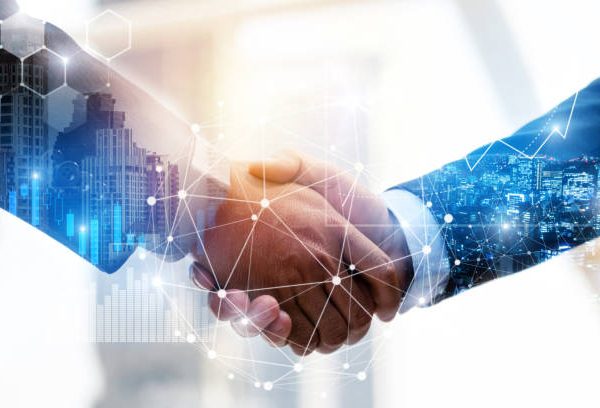 istockphoto-1313742092-612x612 Business Partnership. business man investor handshake with effect global network link connection and graph chart of stock market graphic diagram, digital technology, internet and partnership concept