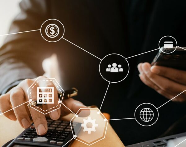 it-asset-management-2--scaled Investors have to calculate investment cost calculator and hold a mobile phone in hand.